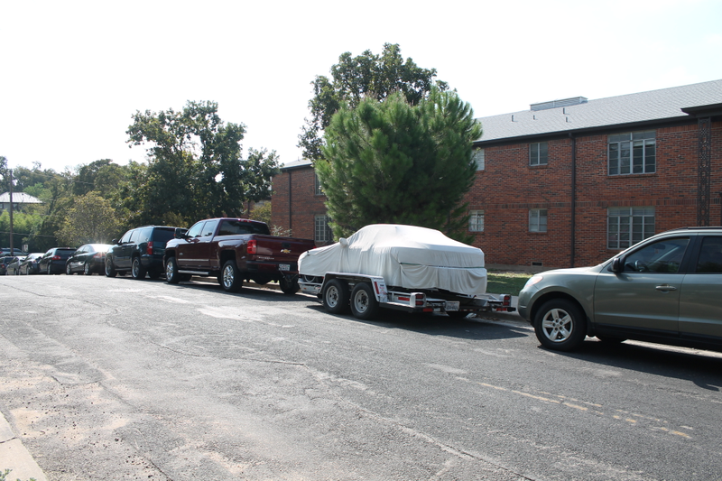 Illustration for article titled Towing A Race Car With A Small House: The Silverado 2500 High Country